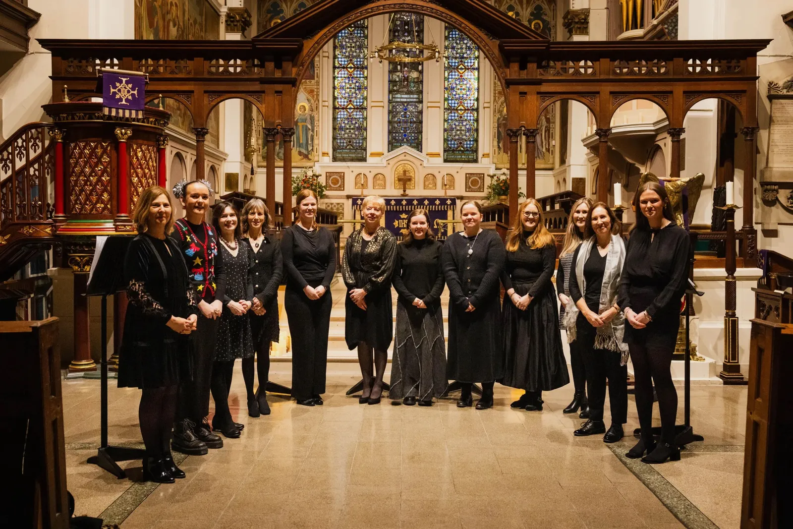 The choirs of St George’s in their red cassocks